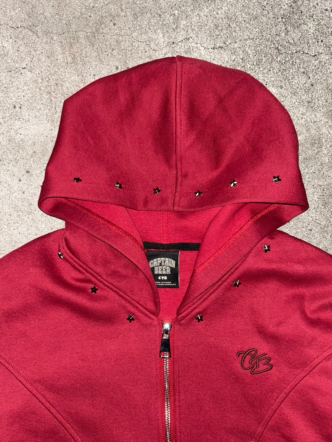 スタッズ付きコンパクトダブルジップパーカー LLS007