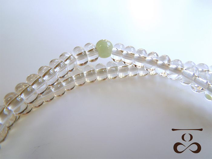 一品(ひとしな)】108ブレス「水晶×ビルマ翡翠」 お数珠の安田念珠店へ