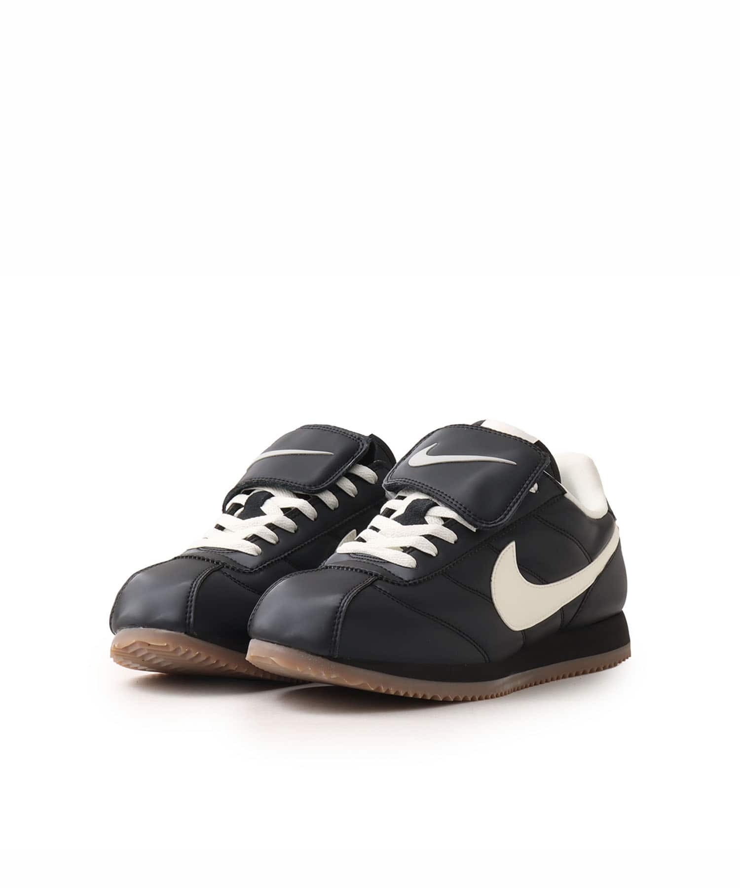 NIKE CORTEZ SE BLACK/SAIL-GUM DARK BROWN-MTLC DARK GREY（ナイキ