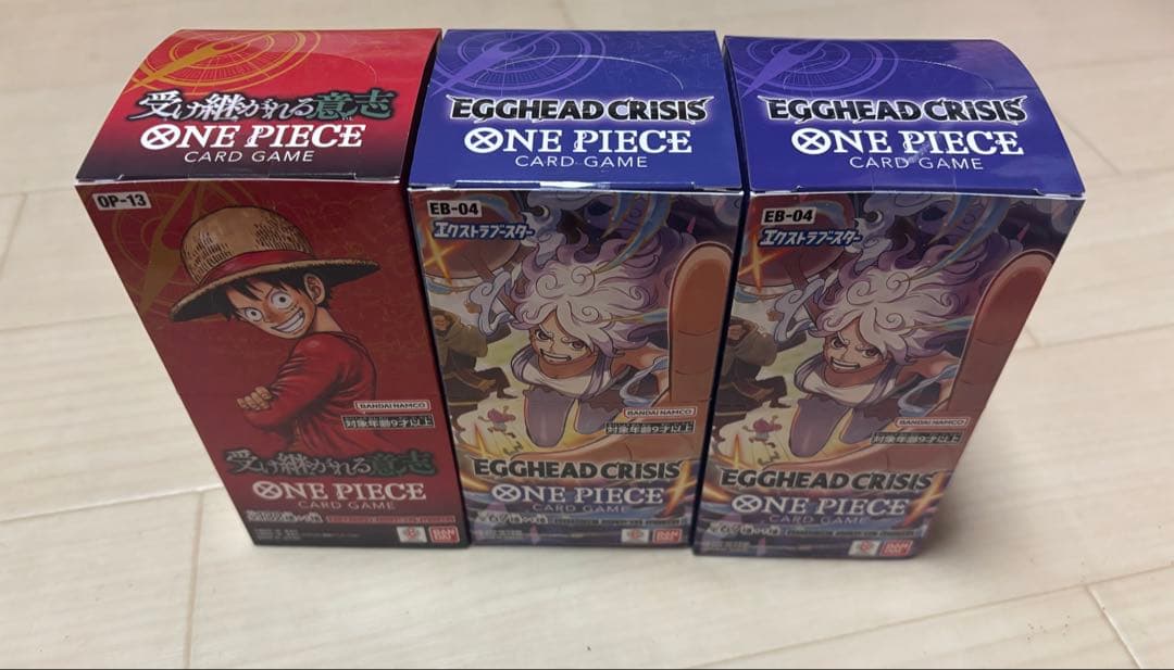 ワンピースカード　受け継がれる意志egghead crisis 未開封テープあり 受け継がれる意志、EGGHEAD CRISIS 未開封 テープ付き - メルカリ