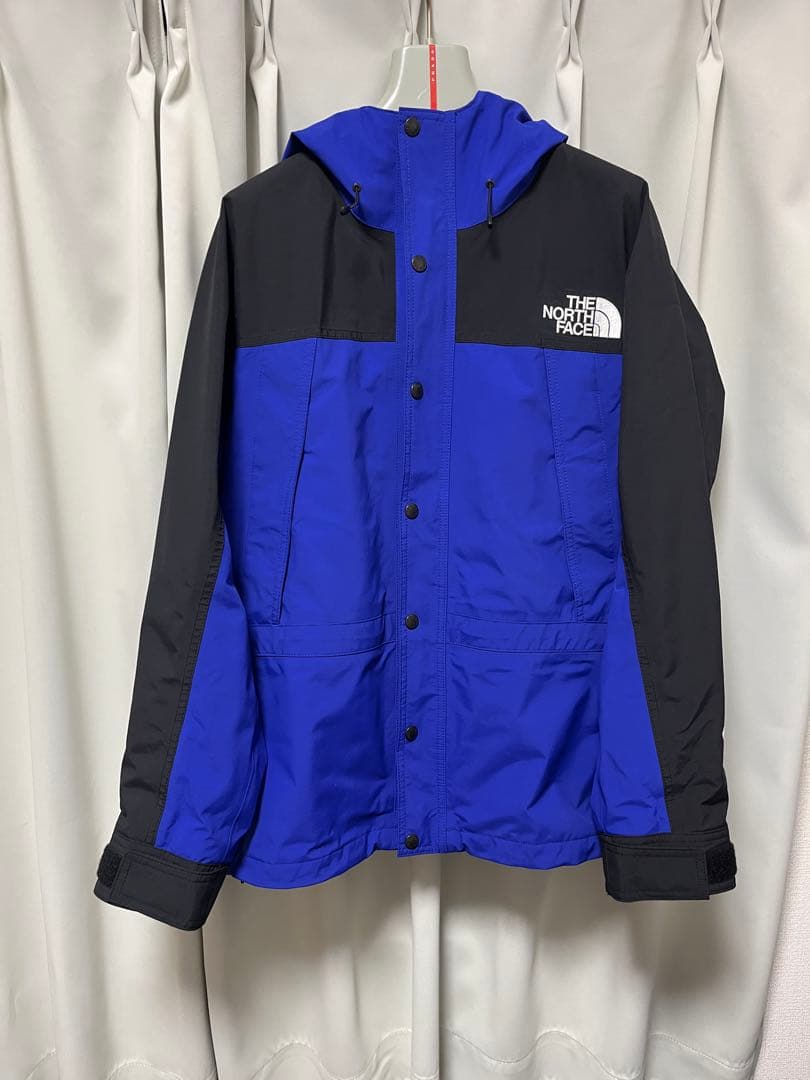 美品　THE NORTH FACE マウンテンパーカー ラピスブルーMサイズ THE NORTH FACE（ザ ノースフェイス） マウンテンパーカー ウインド