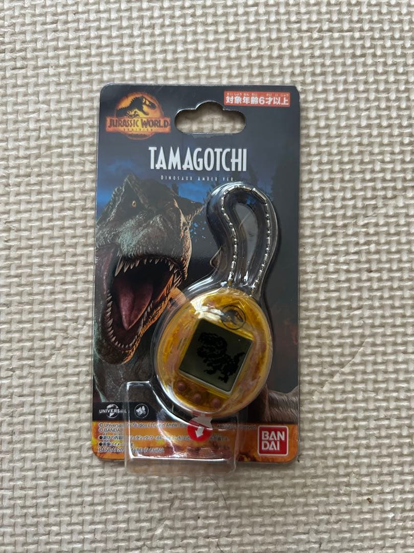 ジュラシックワールド たまごっち アンバーバージョン - メルカリ