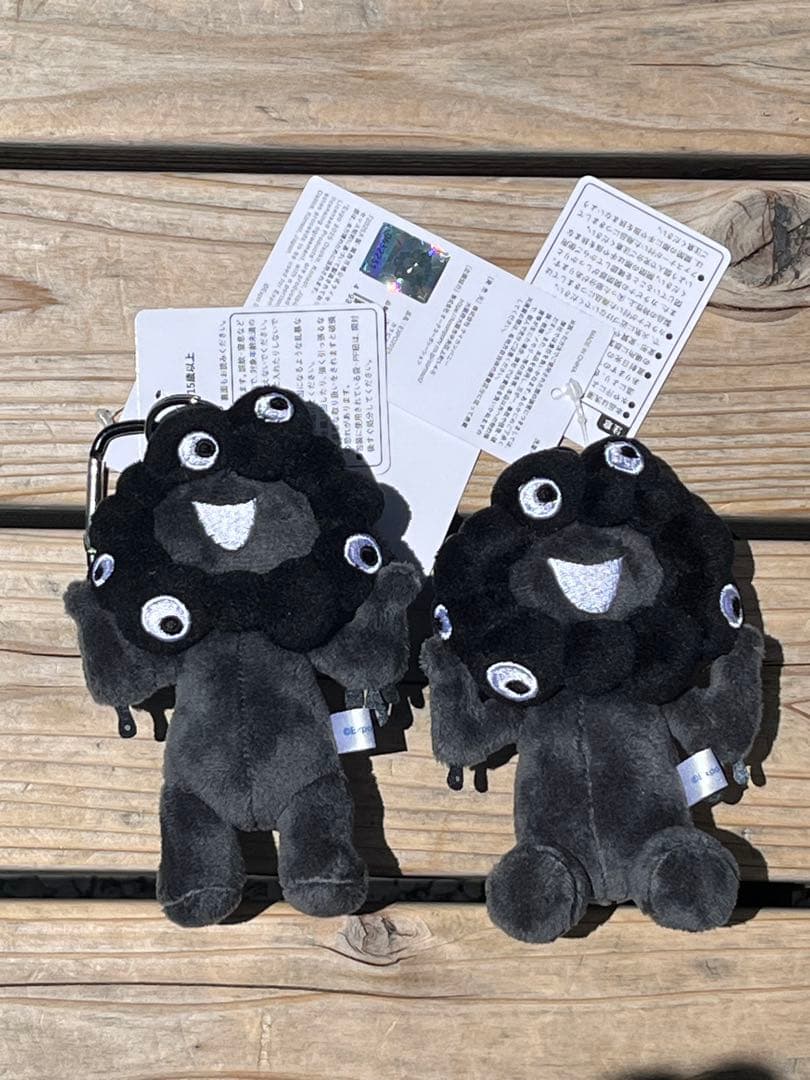 黒ミャクミャク2個セット 立ち座りセット - メルカリ