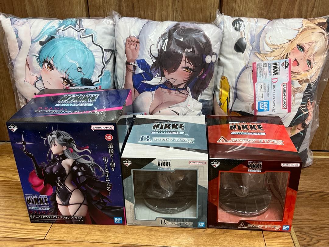 一番くじ 勝利の女神：NIKKE フィギュア　クッションコンプリートセット セクシーな背中もバッチリ！『勝利の女神：NIKKE』新作一番くじが発売