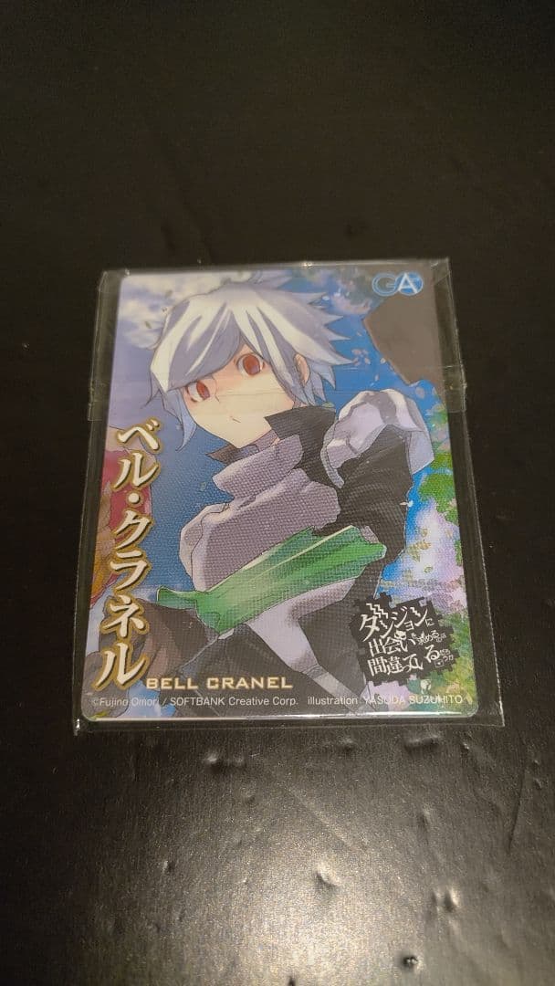 刊行初期キャンペーン品 ダンまち TCセット ダンまち」10周年記念切手セット、ファミリアのエンブレムかたどった