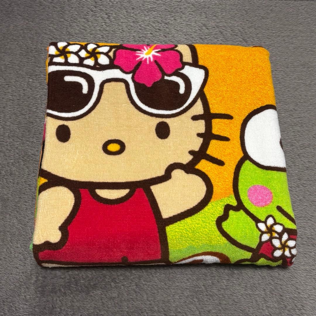 サンリオ 大判バスタオル 日焼けキティ グアム限定 - メルカリ